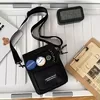 Vintage Nylon Crossbody Bag with Hidden Front Zipper Pocket Black color SKU reference