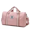 Nylon Duffel with Striped Webbing and Shoe Compartment Pink color SKU reference