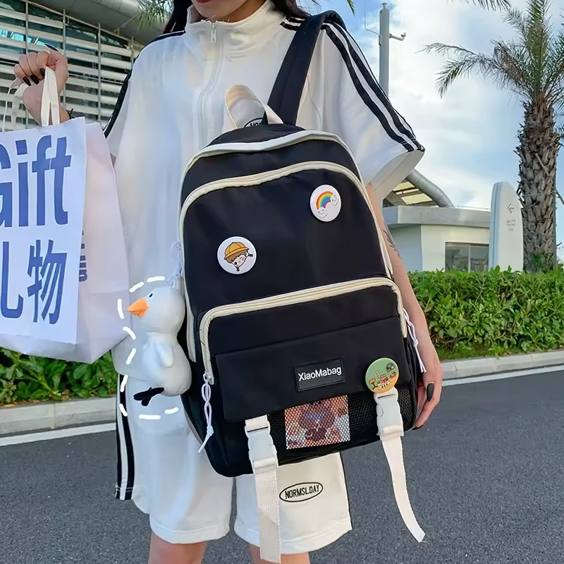 Color-Block School Backpack with Mesh Pocket and Duck Charm product reference image