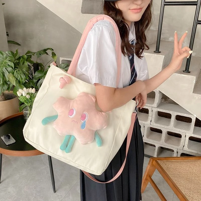 Star-Shaped Nylon Tote with Knotted Handle and Removable Strap product reference image