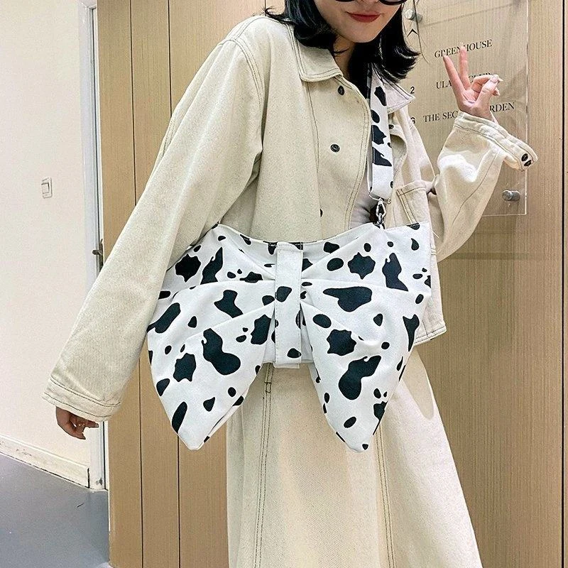 Bow-Detail Canvas Shoulder Bag with Pattern Options product reference image
