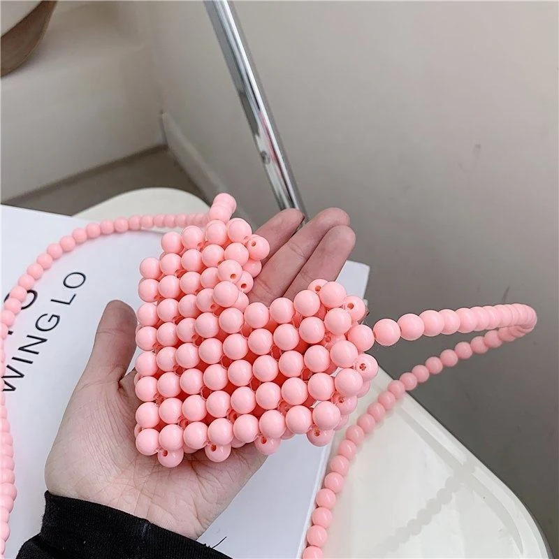 Heart-Shaped PVC Hollow Mini Clutch with Bead Detail product reference image