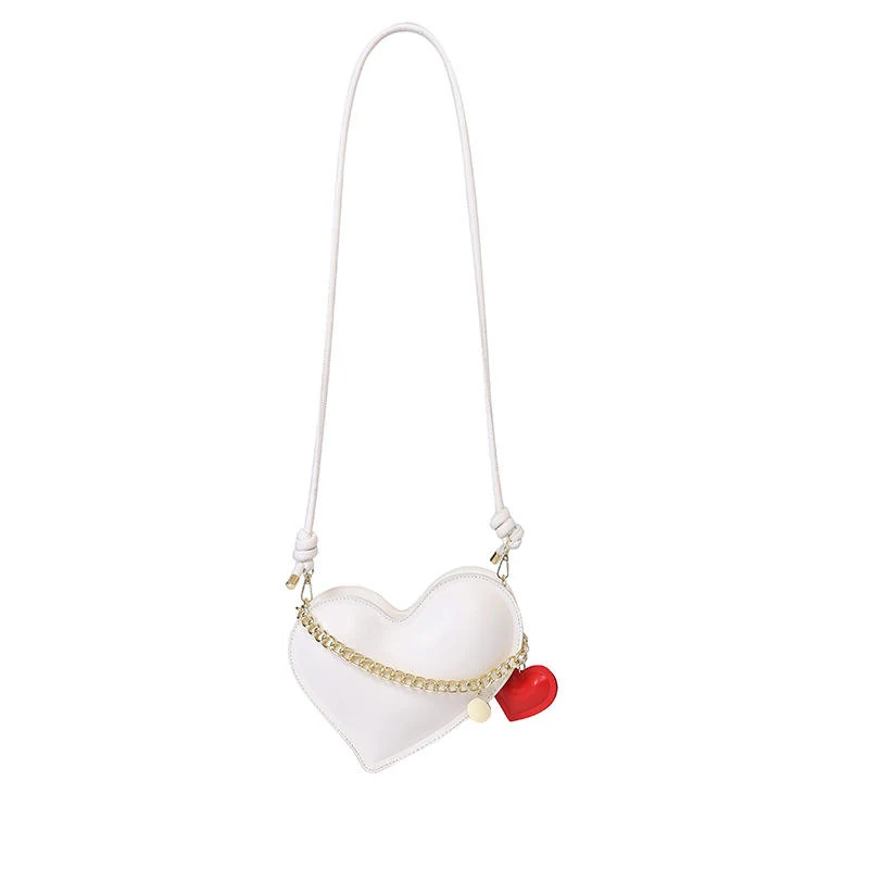 Heart-Shaped PU Crossbody Bag with Pendant Detail White color SKU reference