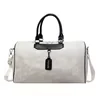 Woven PU Travel Duffel with Pendant Detail White color SKU reference