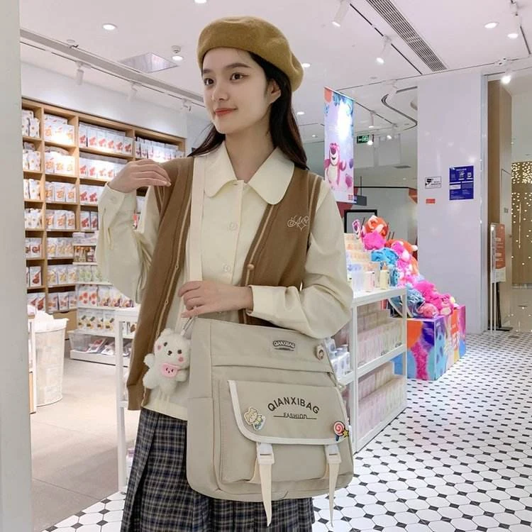 Canvas College Crossbody Bag with Bear Pendant White color SKU reference