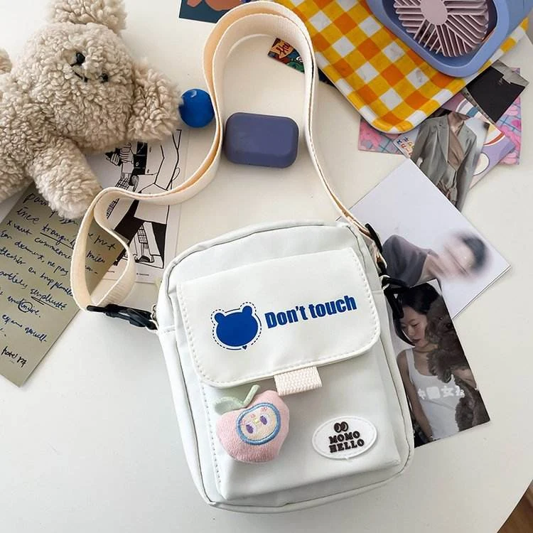 Mini Nylon Crossbody Bag with Bear Pendant & Adjustable Strap White color SKU reference