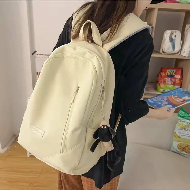 Nylon School Backpack with Lamb Pendant product reference image