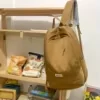 Nylon School Backpack with Lamb Pendant Brown color SKU reference