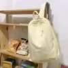 Nylon School Backpack with Lamb Pendant Light Yellow color SKU reference