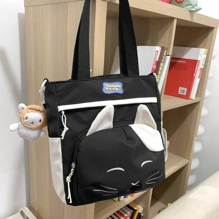 Cat-Pattern Crossbody Bag with Doll Pendant product reference image