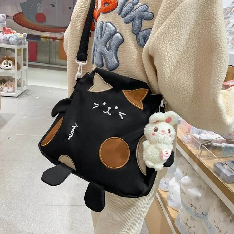Nylon Cartoon Cat Crossbody Bag with Rabbit Pendant product reference image