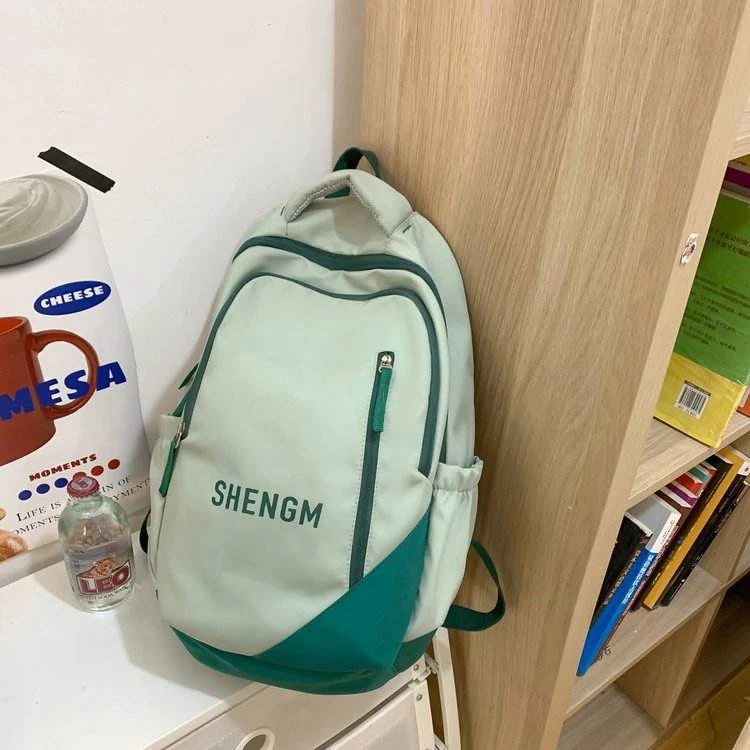 Nylon School Backpack with Plush Pendant & Side Pockets product reference image