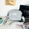 Nylon Mini Crossbody Bag with Letter Label Blue color SKU reference