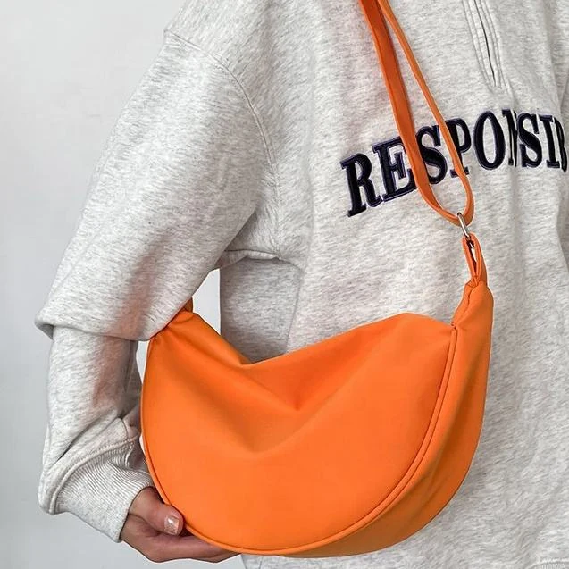 Dumpling-Shape Polyester Crossbody Bag in Six Colors product reference image