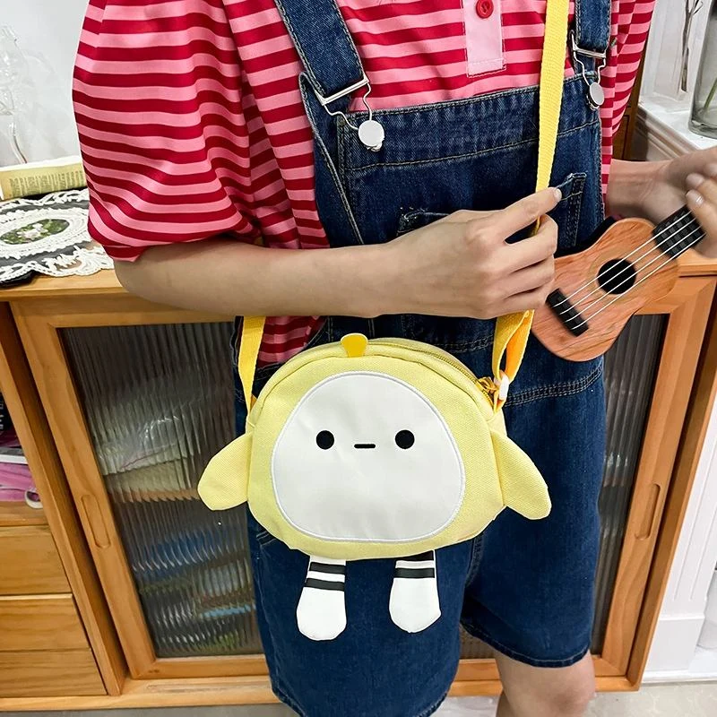 Egg-Shape Canvas Crossbody Bag with Two Expression Options product reference image