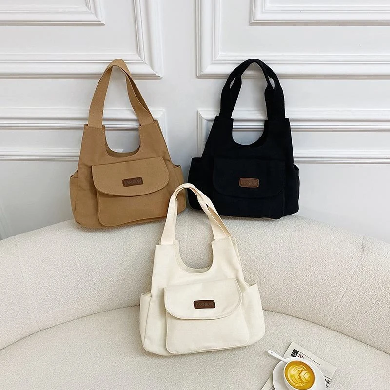 Multi-Pocket Canvas Square Tote with Rear Zipper Pocket product reference image