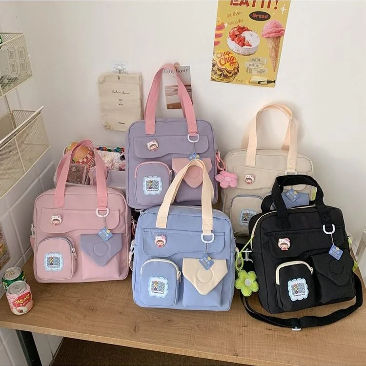 Nylon Multi-Pocket Crossbody Bag with Flower Pendant product reference image