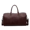 Woven-Look PU Travel Duffel with Adjustable Strap Coffee Brown color SKU reference