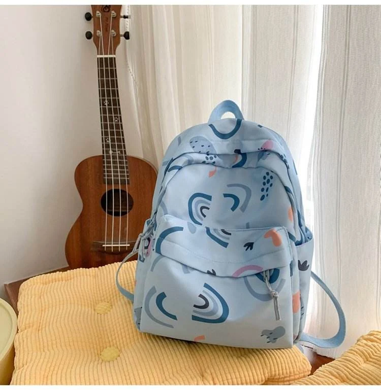 Printed Nylon Multi-Pocket Student Backpack Sky blue color SKU reference