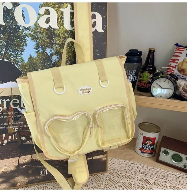 Letter-Print Nylon School Backpack with Doll Charm Yellow color SKU reference