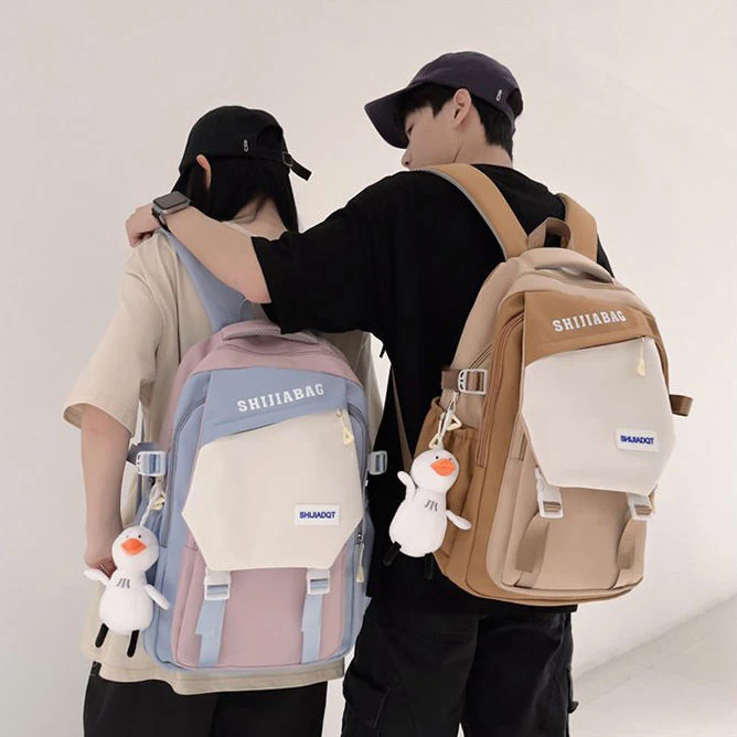 Color-Block Nylon Student Backpack with Plush Pendant product reference image
