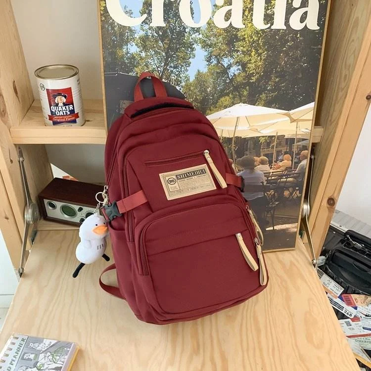 Duck-Pendant Nylon Student Backpack Red color SKU reference