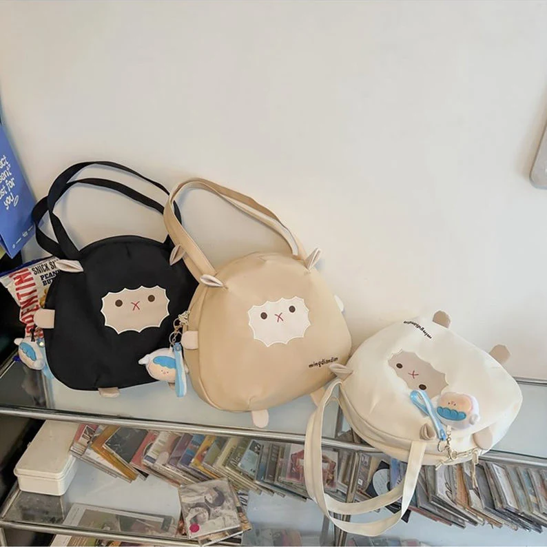 3D Sheep Embroidered Nylon Shoulder Bag with Plush Charm product reference image