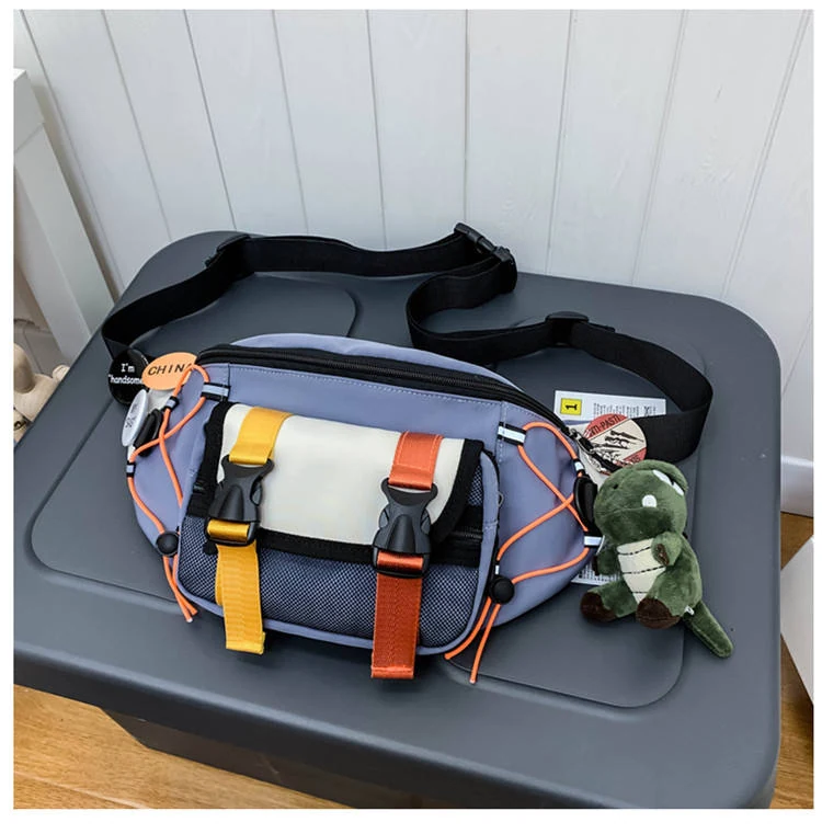 Nylon Chest and Crossbody Bag with Dinosaur Pendant Sky Blue color SKU reference