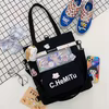 Cotton Mesh-Pocket Messenger Tote Black color SKU reference
